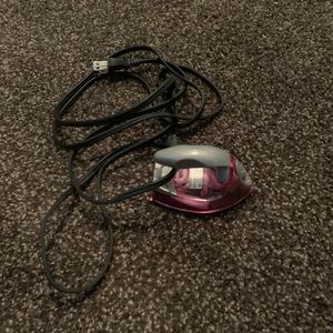 Mini travel iron.